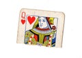 A torn half of a vintage queen of hearts playing card. Royalty Free Stock Photo