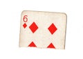 A torn half of a vintage six of diamonds playing card. Royalty Free Stock Photo