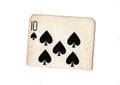 A torn half of a vintage ten of spades playing card. Royalty Free Stock Photo