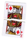 Torn halves of a king of diamonds playing card. Royalty Free Stock Photo