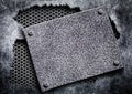 Torn hole in metal, steel mesh plate Royalty Free Stock Photo