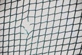 Torn hole in net Royalty Free Stock Photo