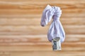 Torn old sock full of holes. one dollar and euro fall from the hole. the concept Royalty Free Stock Photo