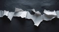 Torn Paper Background with Rip and Hole Effect on Dark Surface Royalty Free Stock Photo
