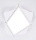 Torn paper sheet with an empty gap hole Royalty Free Stock Photo