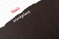 Torn paper with text toxic workplace Royalty Free Stock Photo