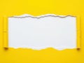 Torn paper on yellow background Royalty Free Stock Photo