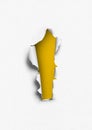 Torn paper with yellow hole Royalty Free Stock Photo