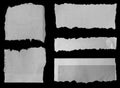 Torn papers on black Royalty Free Stock Photo