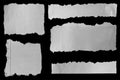 Torn papers on black Royalty Free Stock Photo