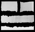 Torn papers on black Royalty Free Stock Photo