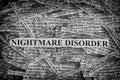 Torn pieces of paper with the words Nightmare Disorder