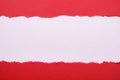 Torn red paper strip center ripped edge white background copy space Royalty Free Stock Photo