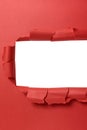 Torn red paper strip with white background, copy space vertical Royalty Free Stock Photo