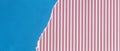 Torn rip light blue paper on colorful white and pink striped color background. Abstract colored paper banner background Royalty Free Stock Photo