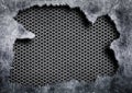 Torn steel with a gray mesh background damaged metal Royalty Free Stock Photo
