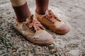 Torn student shoes, Poverty of rural schoolchildren often cannot afford new shoes, high school student legs wearing torn shoes, Royalty Free Stock Photo