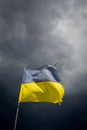 Torn Ukrainian flag on the background of a stormy Royalty Free Stock Photo
