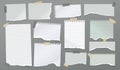 Torn of white and green notebook paper pieces stuck with sticky tape on dark grey background for text, advertising or
