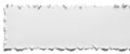 torn white paper strip with jagged edges on blank background Royalty Free Stock Photo