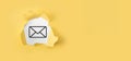 Torn yellow paper with letter email icon on white background.Email marketing and newsletter concept. Contact us by newsletter