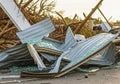 Tornado aftermath: wrecked structures and broken glass amidst devastation Royalty Free Stock Photo