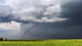 Tornado with dark storm clouds Royalty Free Stock Photo