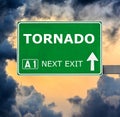 TORNADO road sign against clear blue sky Royalty Free Stock Photo