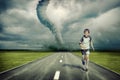 Tornado and running boy Royalty Free Stock Photo