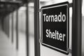 Tornado shelter sign, black and white photo Royalty Free Stock Photo