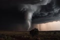 tornado, towering and deadly, with lightning flashing in the sky Royalty Free Stock Photo