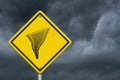 Tornado warning on a on yellow highway caution road sign Royalty Free Stock Photo