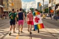 Rear view of a group of five young men walking on Church Street after Pride Parade Royalty Free Stock Photo