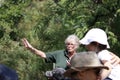 Toronto Canada, August 24 2019: The cheetah zoo keeper speaks to a crowd around the habitat about the care regime of the cheetah. Royalty Free Stock Photo