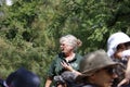 Toronto Canada, August 24 2019: The cheetah zoo keeper speaks to a crowd around the habitat about the care regime of the cheetah. Royalty Free Stock Photo