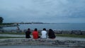 People look at Ontario lake