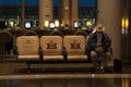 TORONTO, CANADA - 08 20 2020: Elderly passenger wearing facial mask in seats marked for social distancing according to