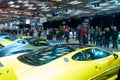 Visitors view the presented cars at the 2020 Canadian International Auto Show