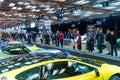 Visitors view the presented cars at the 2020 Canadian International Auto Show