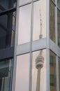 Toronto, Canada - January 27, 2016: CN Tower reflected in a window Royalty Free Stock Photo