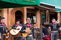 TORONTO, ON, CANADA - JULY 29, 2018: A mariachi band plays in front of a crowd in Toronto`s vibrant Kensington Market.