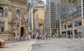 TORONTO, ON, CANADA- July 23, 2023: People crossing the street a pedestrian crossing