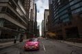 York Street in Downtown Toronto, with a car waiting at a light, in a typical CBD American street with office buildings Royalty Free Stock Photo