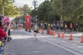 TORONTO, ON/CANADA - OCT 22, 2017: Canadian marathon runner Leslie Sexton passing the 33km turnaround point