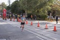 TORONTO, ON/CANADA - OCT 22, 2017: Canadian marathon runner Leslie Sexton passing the 33km turnaround point