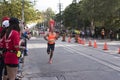TORONTO, ON/CANADA - OCT 22, 2017: Marathon runner Jean-Philippe passing the 33km turnaround point at the 2017 Scotiabank Toronto