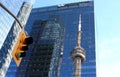 CN Tower reflected in Marsh & McLennan skyscraper in Toronto. Royalty Free Stock Photo