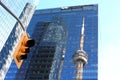 CN Tower reflected in Marsh & McLennan skyscraper in Toronto. Royalty Free Stock Photo