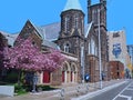 Old stone church and reserved bike lane on Bloor Street near University of Toronto