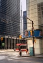 TORONTO, CANADA - 06 05 2021: Pedestrians and streetcar in front of Toronto Dominion Bank Tower at King at Bay street